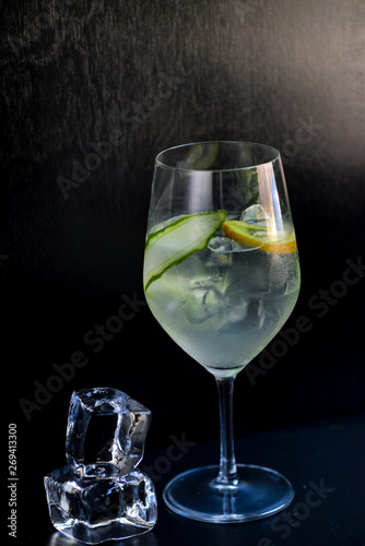 cocktail with kiwi and non-alcoholic cucumber in a glass