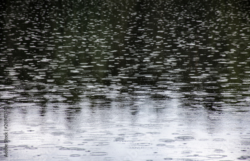 Rainy day on water surface