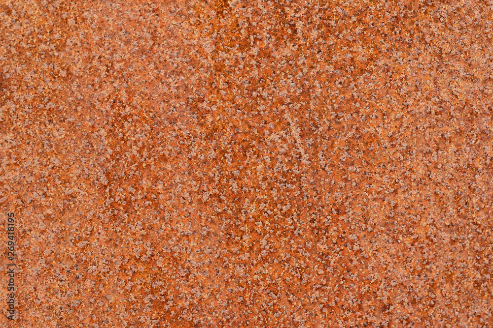 Close up macro view of flecked old rusty metal surface yellow-orange color. Detailed pattern texture or background taken in natural environment. Weathered over years, unique effect to textured design. Close up macro view of flecked old rusty metal surface yellow-orange color. Detailed pattern texture or background taken in natural environment. Weathered over years, unique effect to textured design.