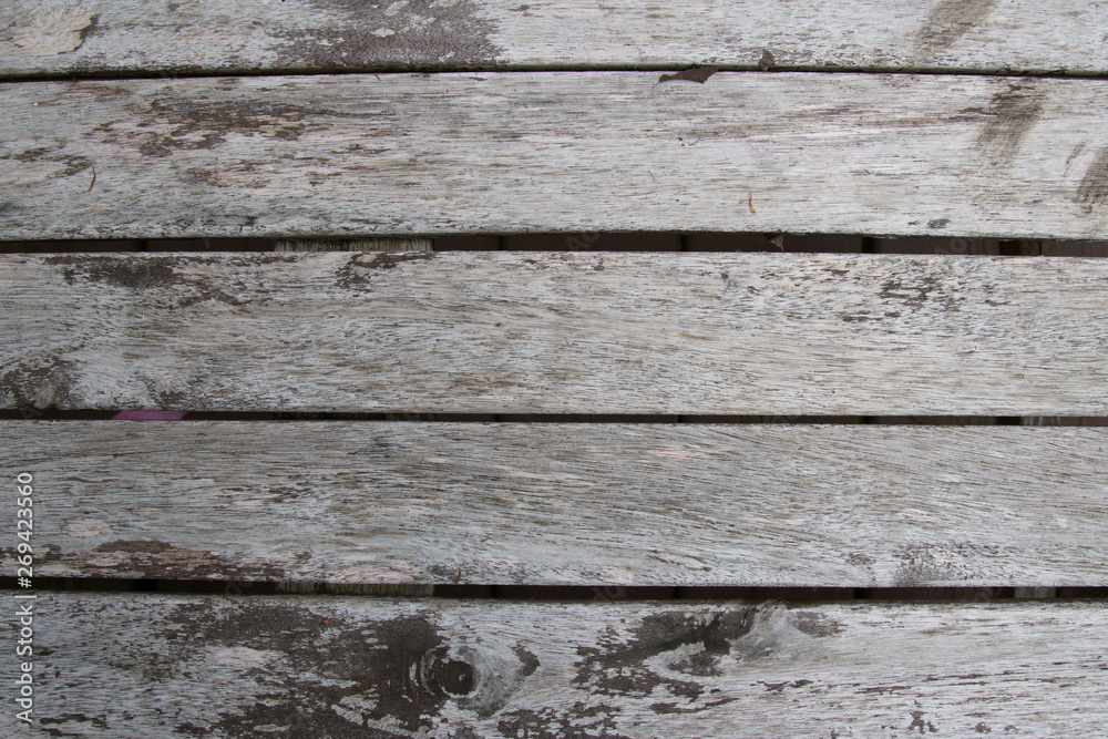 A striped wooden background wih planks.