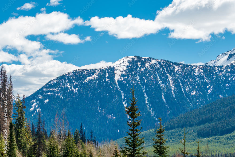 View of snow mountains at summer in British Columbia, Canada.