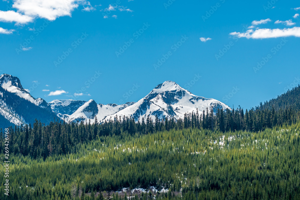 View of snow mountains at summer in British Columbia, Canada.