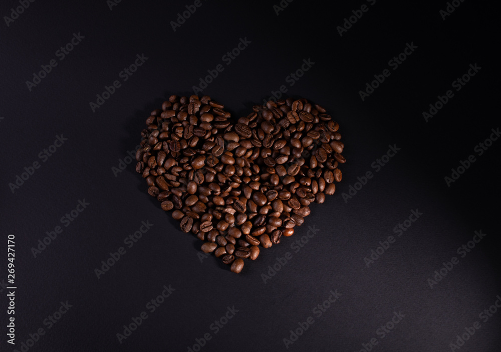 Heart-filled coffee beans with lower right lighting Heart-filled coffee beans with lower right lighting