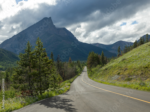 Road leading towards mountain, Red Rock Canyon Parkway, Waterton Lakes National Park, Alberta, Canada