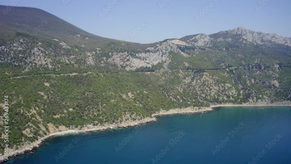 Aerial of a road through the mountains on the Crimea coast. drone