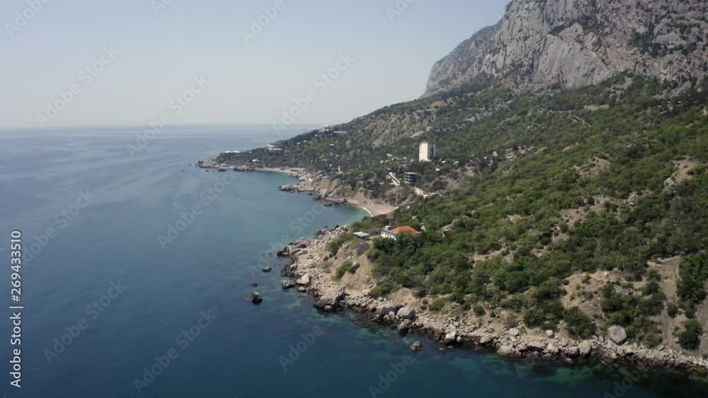 Aerial of nature Crimea coast with large mountains and cliffs. Aerial of nature Crimea coast with large mountains and cliffs.