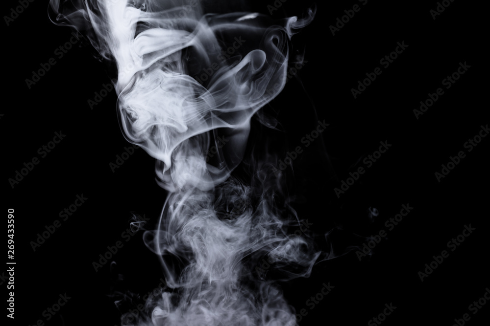 Dry ice smoke Floating in the air, black background Dry ice smoke Floating in the air, black background
