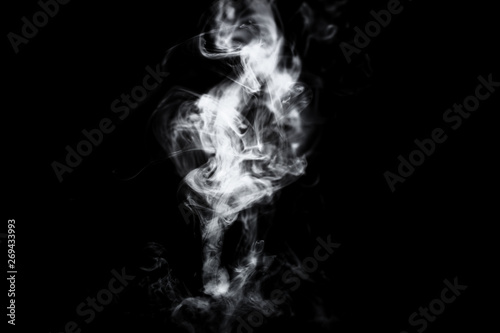 Fototapeta Naklejka Na Ścianę i Meble -  Dry ice smoke Floating in the air, black background
