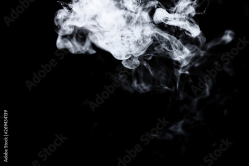 Dry ice smoke Floating in the air, black background © redhoteviler