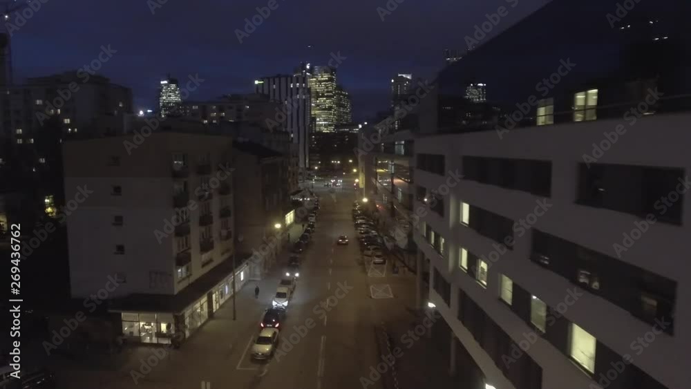 4K. Aerial view of busy streets and lights in downtown Warsaw / Pland, with bright night lighting. 01. March. 2019. aerial view of tall buildings and city streets. 4K. Aerial view of busy streets and lights in downtown Warsaw / Pland, with bright night lighting. 01. March. 2019. aerial view of tall buildings and city streets.