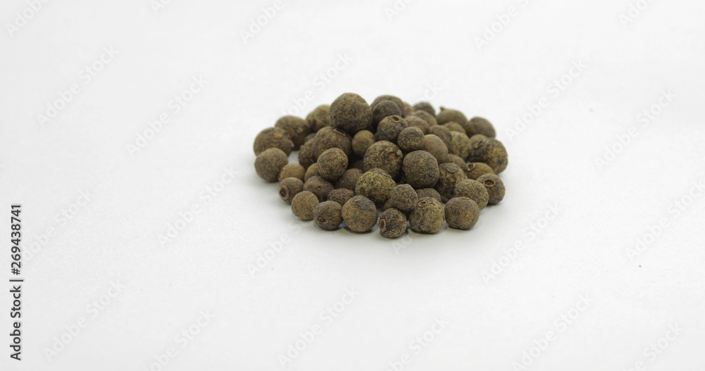 Black pepper. Peas with spices. Macro on white background Black pepper. Peas with spices. Macro on white background