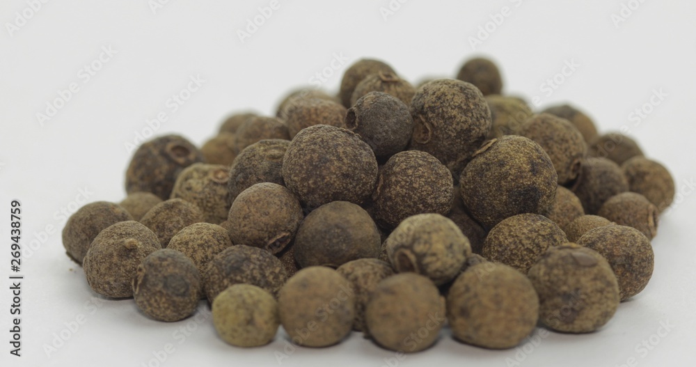 Black pepper. Peas with spices. Macro on white background Black pepper. Peas with spices. Macro on white background
