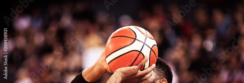basketball player shooting three pointer
