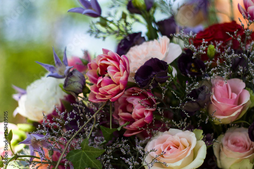 bouquet of different flowers and pink roses