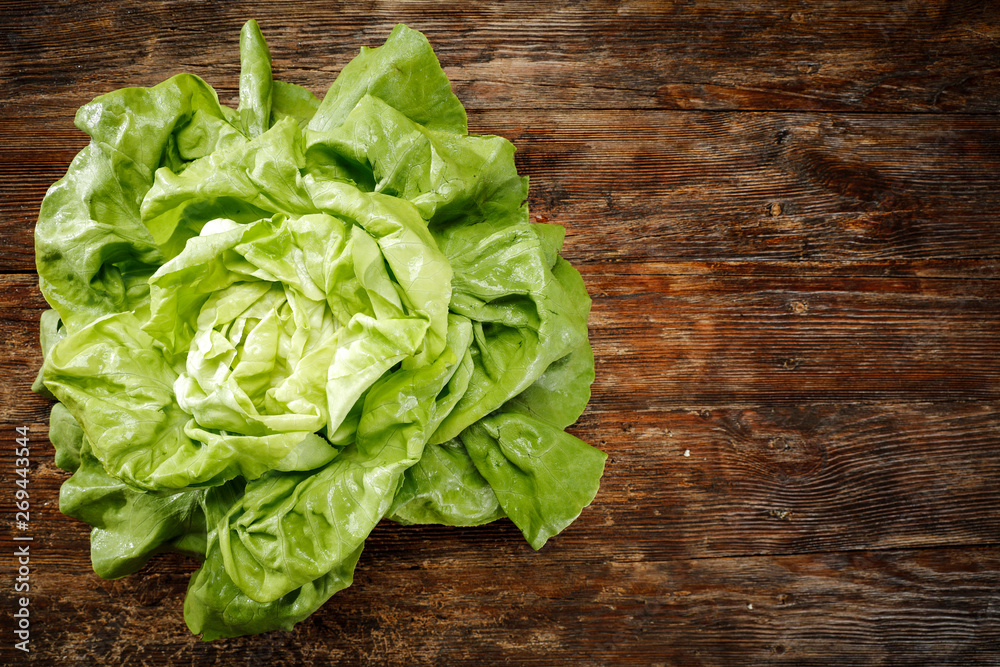 Aerial photo of fresh lettuce on desk Aerial photo of fresh lettuce on desk