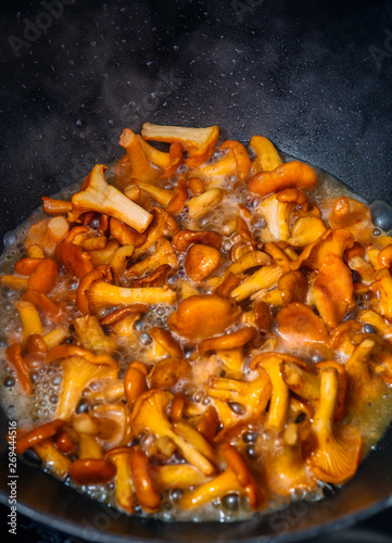 chanterelles are roasted in a cast iron skillet