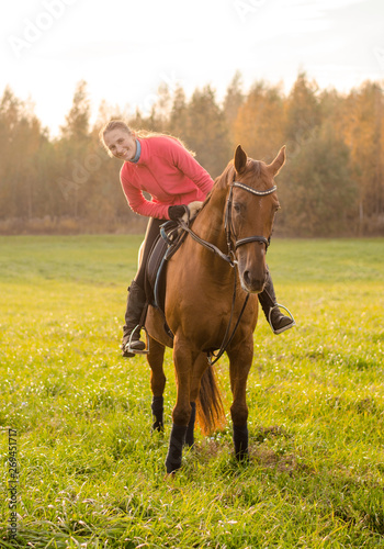 young woman and mare horse in autumn © vprotastchik