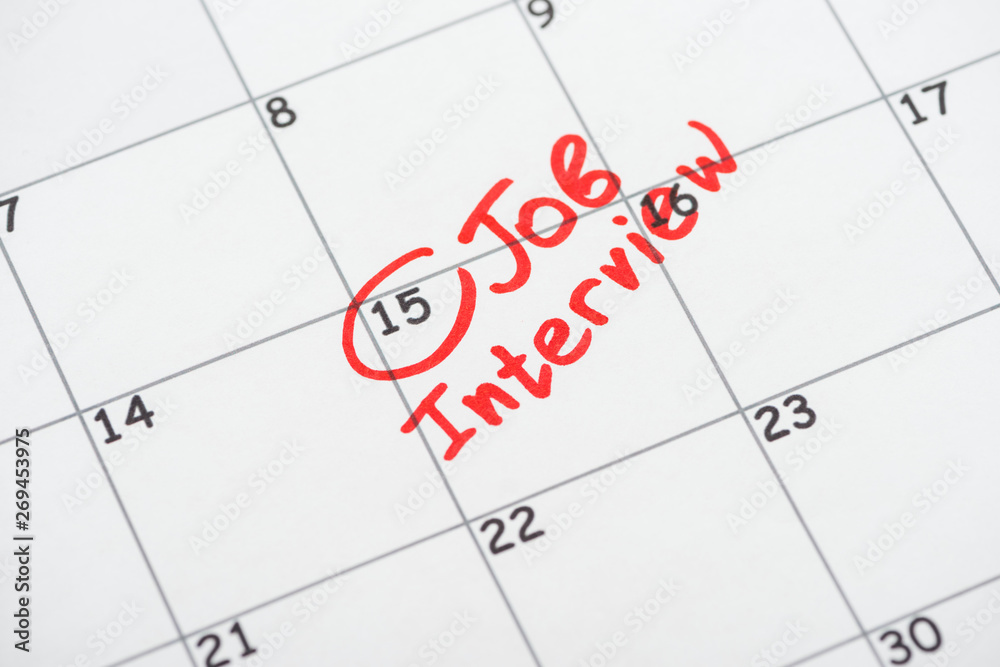 print calendar with red mark and job interview lettering print calendar with red mark and job interview lettering