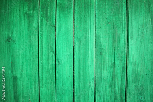 Green wooden wall - vertical painted wood texture for background
