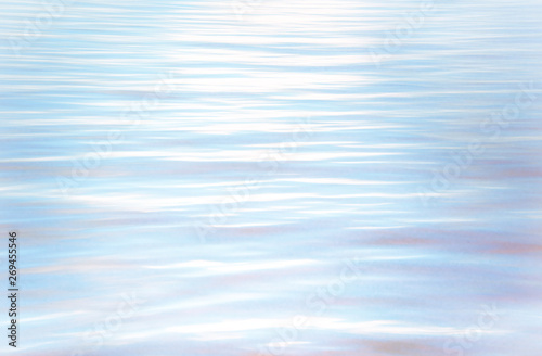 Blue wave in lake. Sun light, bokeh background