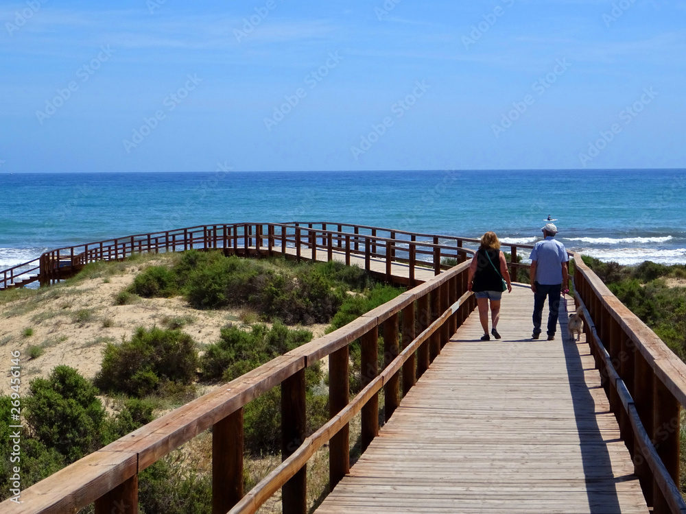 Wooden walkways leading directly to a beautiful beach of fine sand