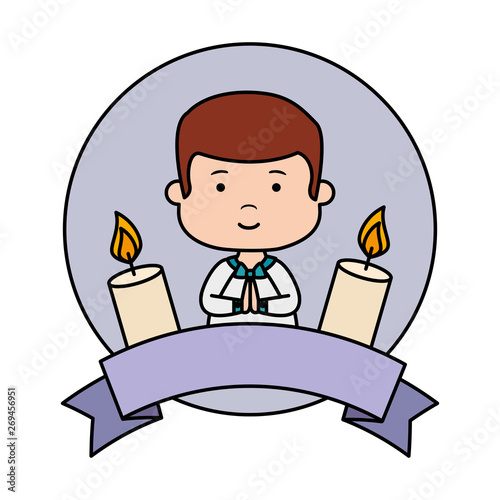 little boy with ribbon and candles first communion