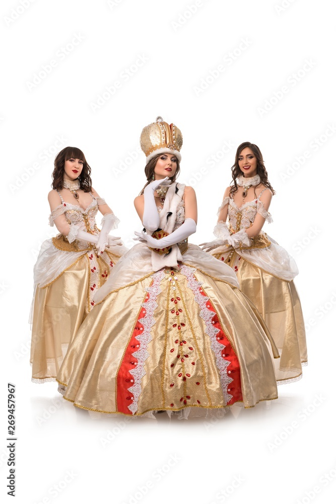 Beautiful models posing in magnificent historical costumes