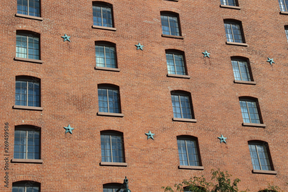 Star decoration of the brown brick wall 
