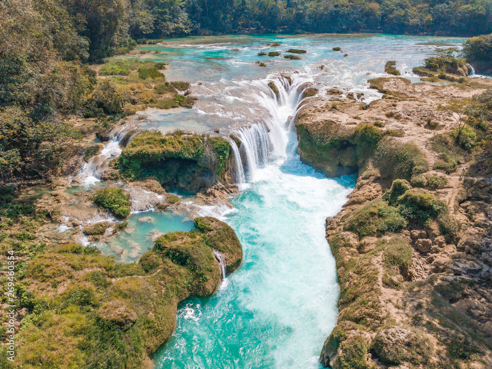 Aerial view of the turquoise waterfalls at Las Nubes in Chiapas, Mexico Aerial view of the turquoise waterfalls at Las Nubes in Chiapas, Mexico