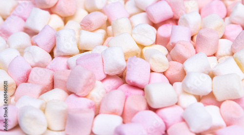 Colorful mini marshmallows background, close-up texture.