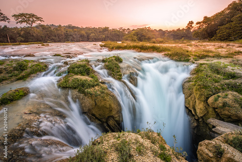 Amazing sunset over the turquoise waterfalls at Las Nubes in Chiapas  Mexico