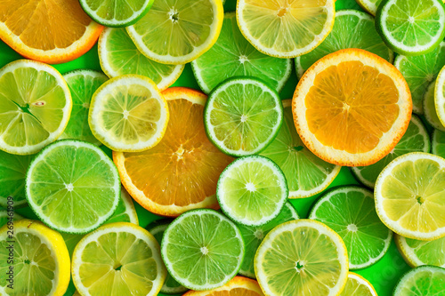 Billede på lærred Citrus fruits slices texture background