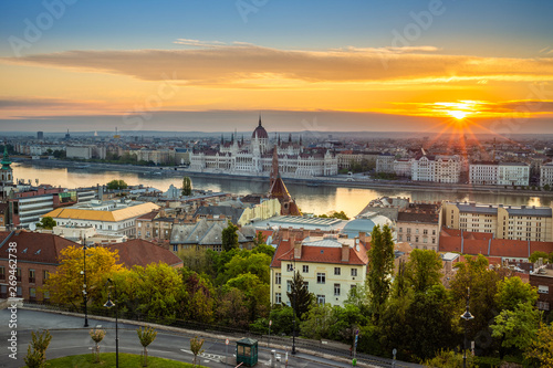 Budapest, Hungary - Aerial panoramic view of Budapest at sunrise with sunlight, residential buildings of Buda side and Parliament of Hungary © zgphotography