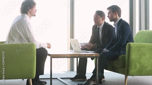 Male applicant and hr team employers disputing at job interview