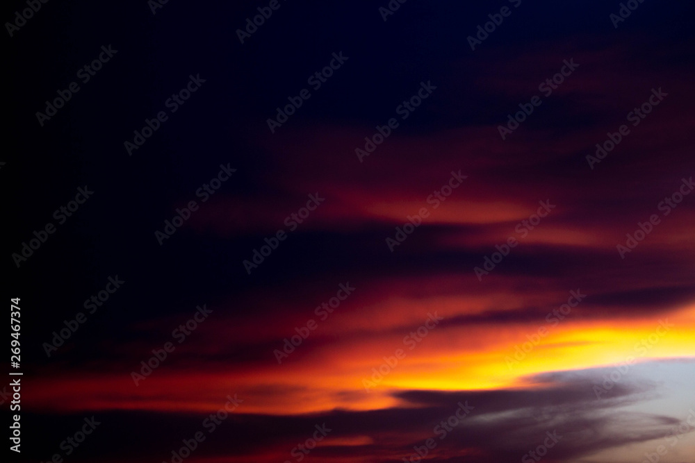 Beautiful colored sunset sky with darkness