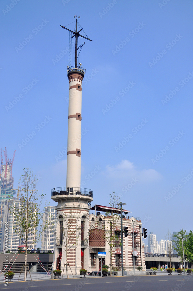 Obraz premium Shanghai Bund Observatory, also known as Meteorological Signal Tower, China. This Spanish Atanu style tower was built in 1907 as a control tower for river traffic in the Huangpu River.