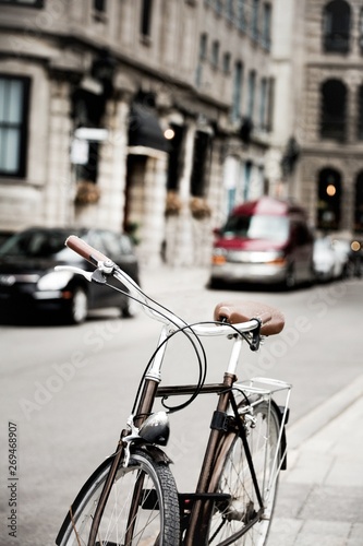 Bike parked in the street of old montreal photo
