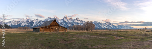 Panorama of the infamous T.A. Moulton Barn during sunrise in Mormon Row, Grand Teton National Park, Wyoming.