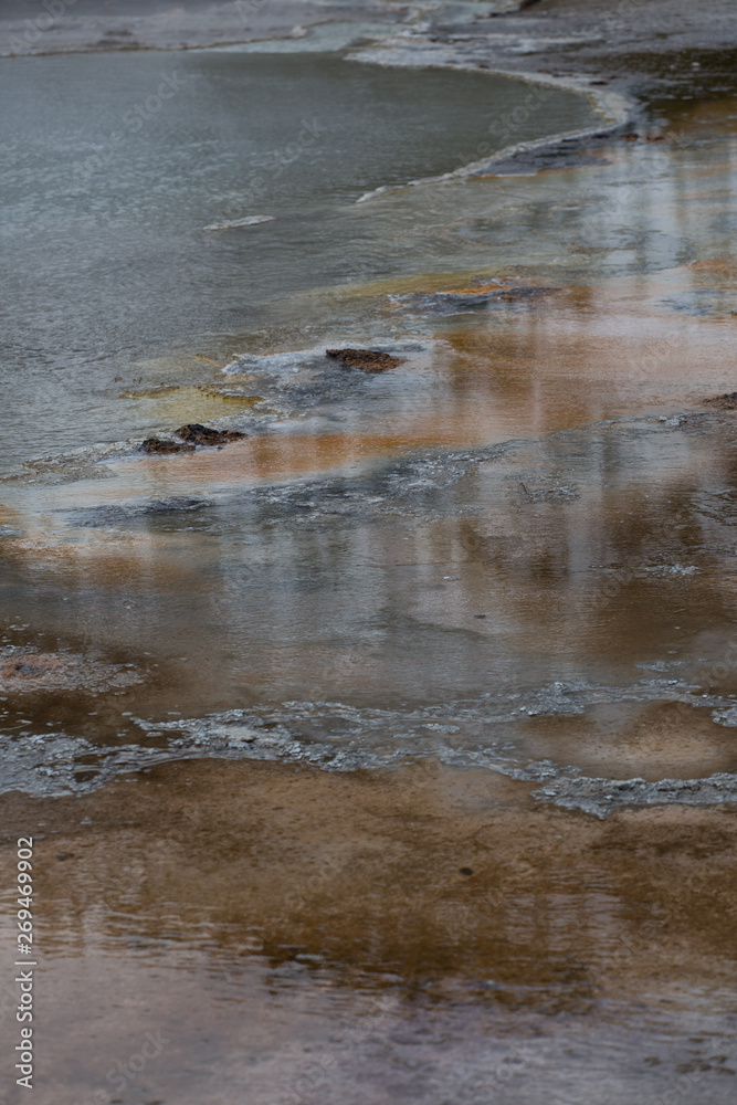 Bacteria, a geothermal feature in Midway Geyser Basin, Yellowstone National Park, Wyoming. Taken during mid-May in the afternoon. Bacteria, a geothermal feature in Midway Geyser Basin, Yellowstone National Park, Wyoming. Taken during mid-May in the afternoon.