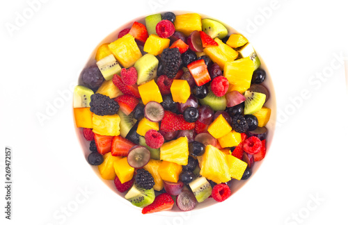 Bowl of Rainbow Colored Fruit Salad Isolated on a White Background