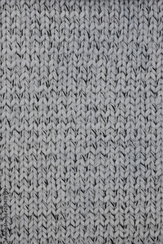 Wool knitted fabric as background and texture