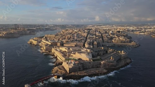 Morning flight around of Valletta old town, Malta photo