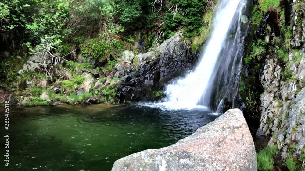 Waterfall in Manteigas, Serra da Estrela (Mountain of Star) in Portugal called Poco do Inferno (Hell Pit)