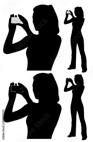 Woman taking a photo with smart phone