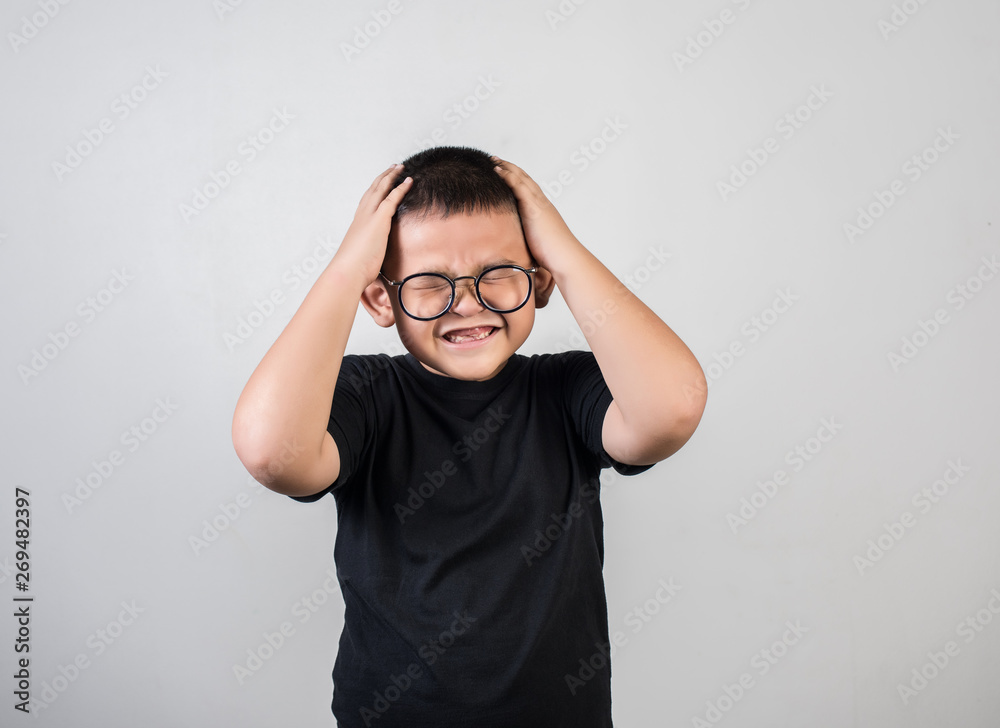 Boy feels sad after the parents scold him Boy feels sad after the parents scold him