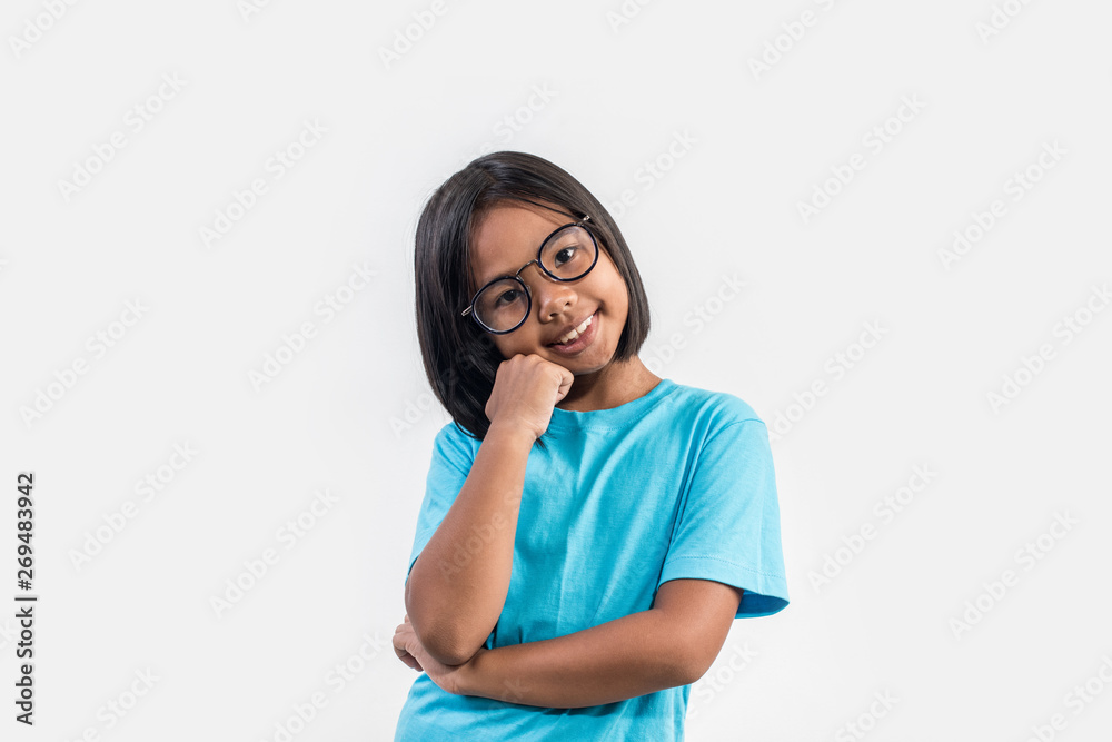 Little girl thinking in studio shot