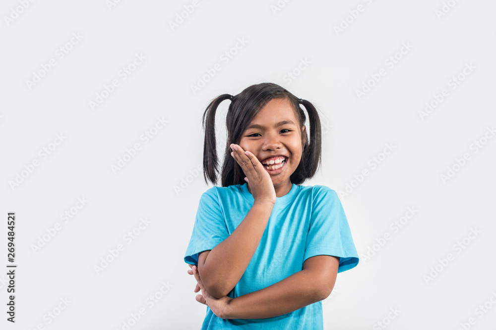 Portrait of Funny little girl acting in studio shot Portrait of Funny little girl acting in studio shot