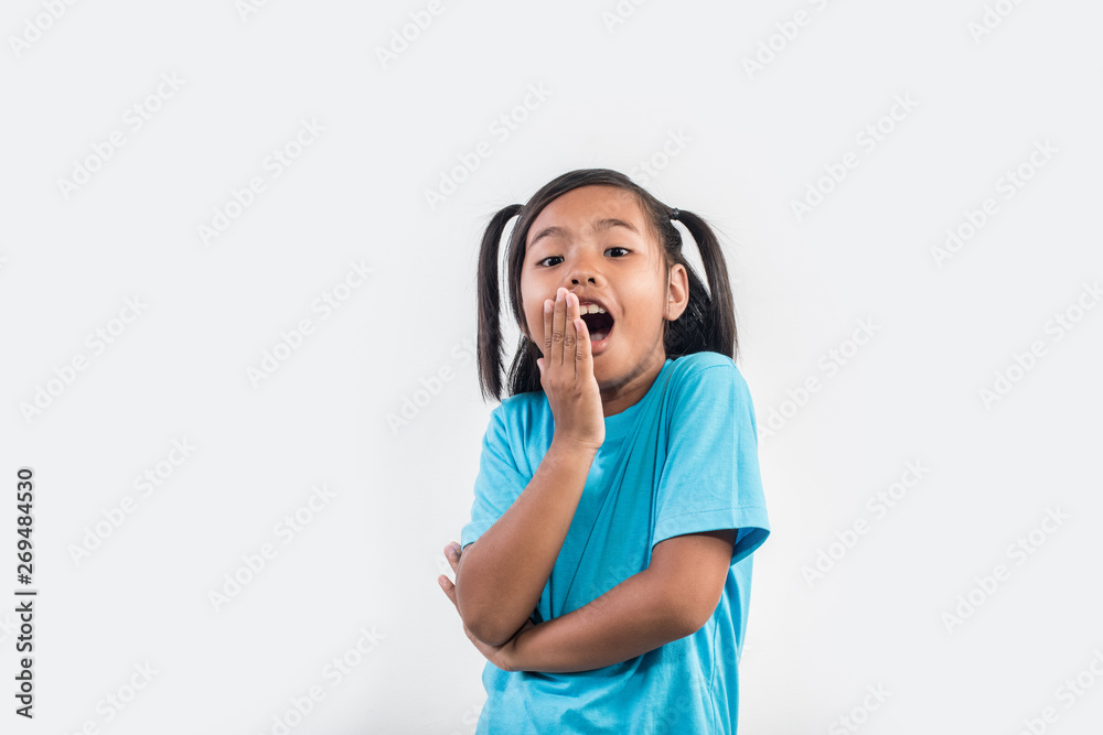 Portrait of Funny little girl acting in studio shot Portrait of Funny little girl acting in studio shot