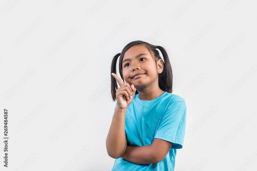 Portrait of Funny little girl acting in studio shot Portrait of Funny little girl acting in studio shot