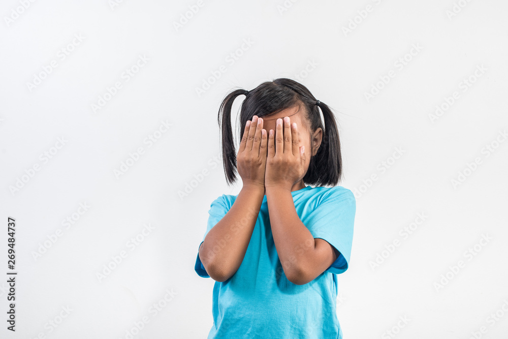 Portrait of Funny little girl acting in studio shot Portrait of Funny little girl acting in studio shot